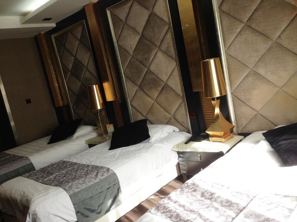 Harbin Yakelai Holiday Hotel Rom bilde